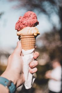 hand holding ice cream cone